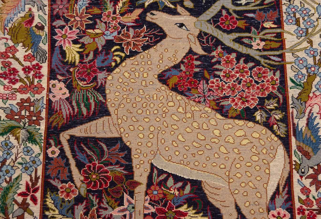 Handmade Bhadohi carpet with deer and floral motif, premium Indian rug design
