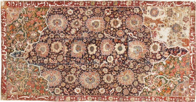 Antique Persian floral rug with intricate patterns and fragmented borders, Bhadohi Carpets House