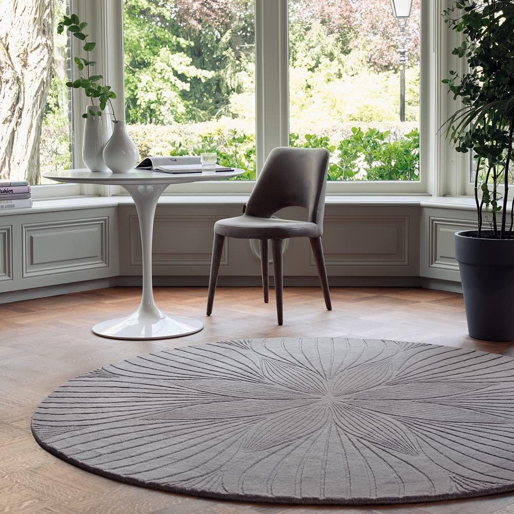 Modern round wool carpet in a bright living room, Bhadohi Carpets House premium rug