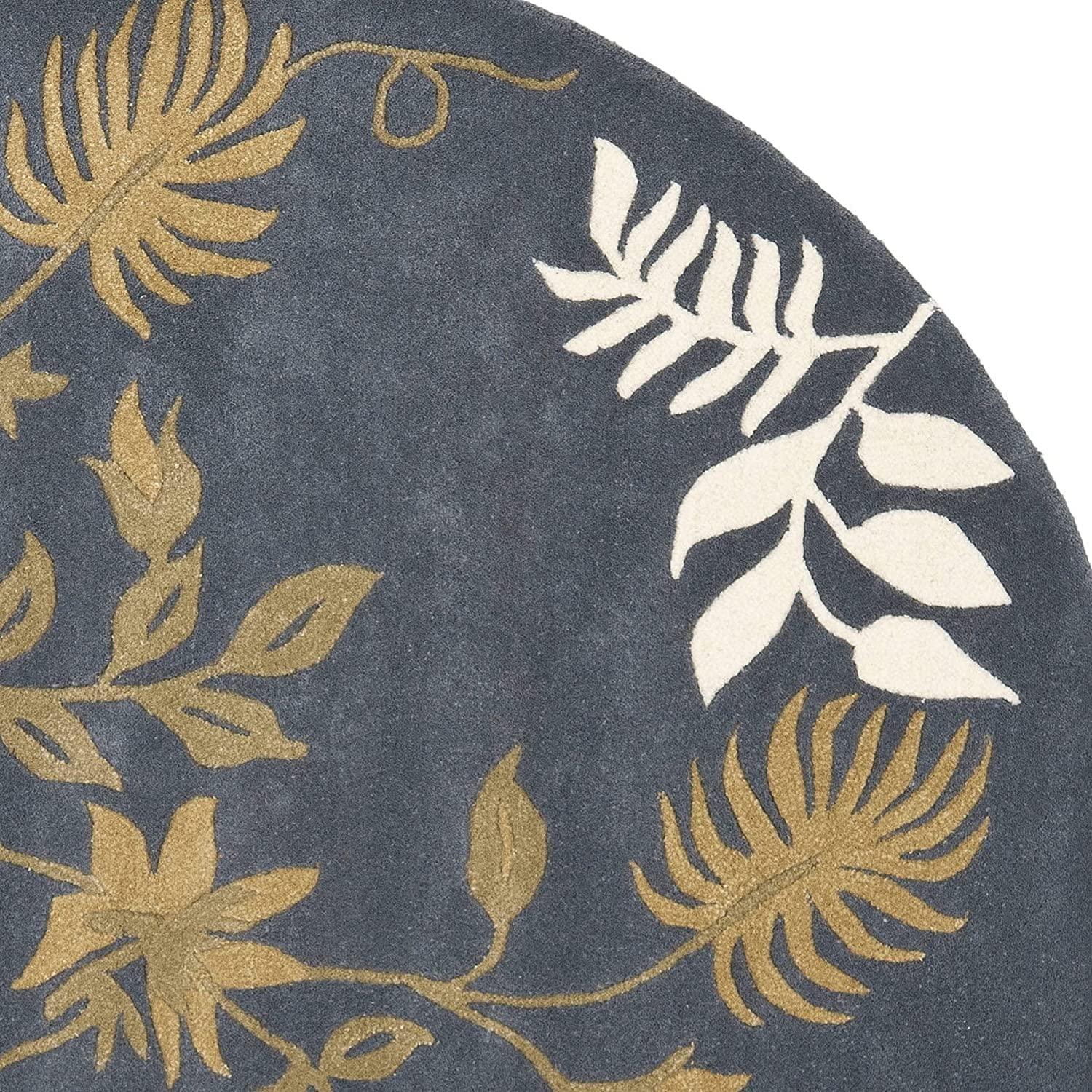 Round blue wool carpet with gold and white leaf pattern, Bhadohi Carpets House