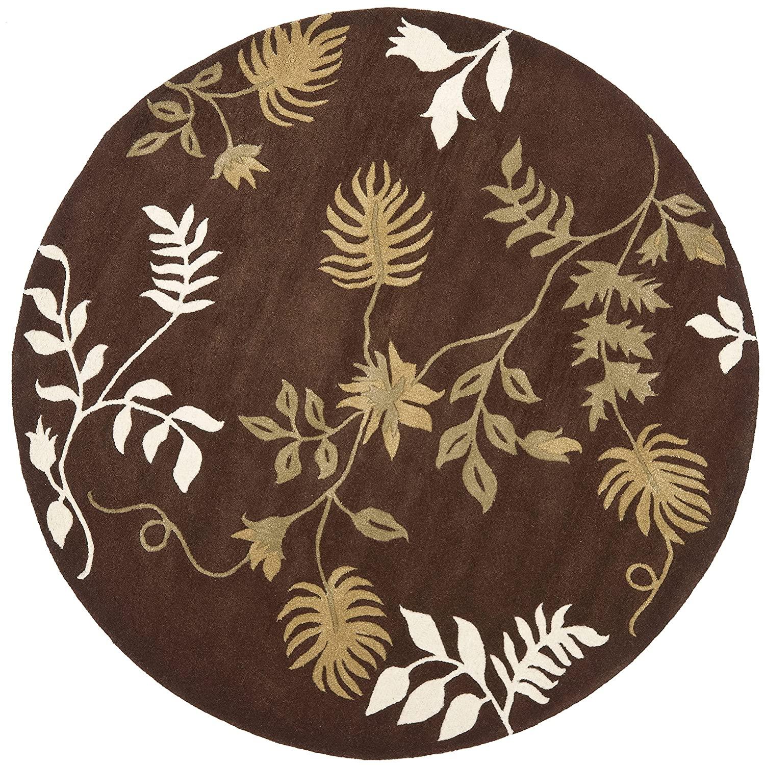 Brown round wool carpet with beige leaf pattern from Bhadohi Carpets House