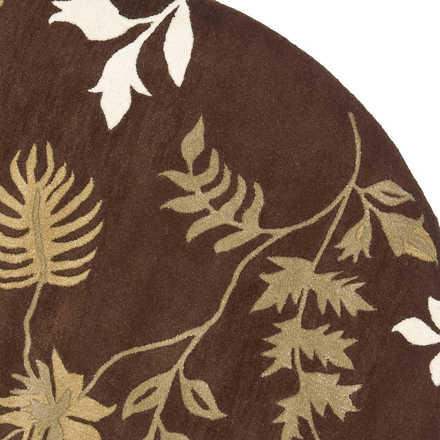 Brown round wool carpet with leaf design from Bhadohi Carpets House