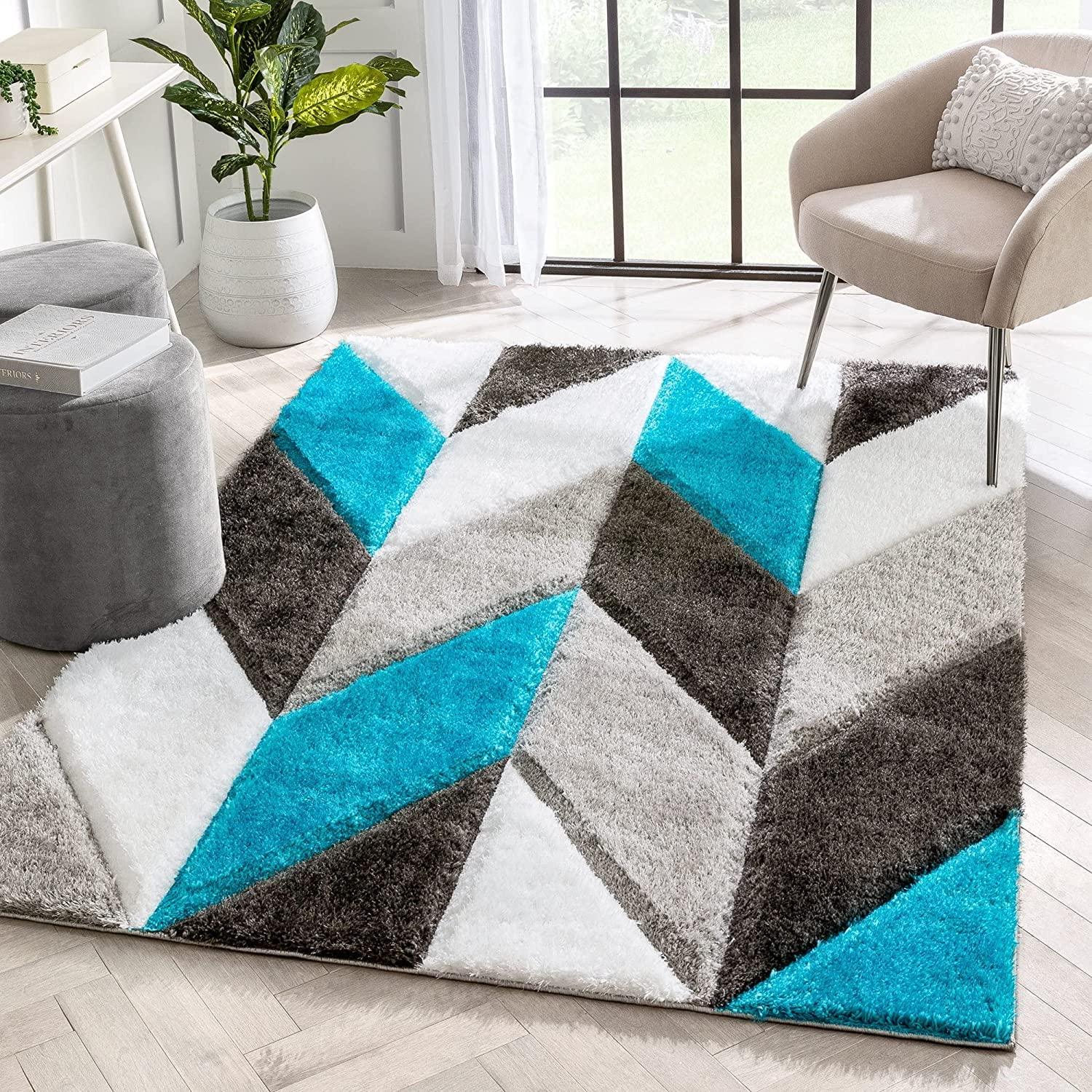 Modern living room with Bhadohi shaggy carpet rug featuring blue, grey, and white geometric pattern