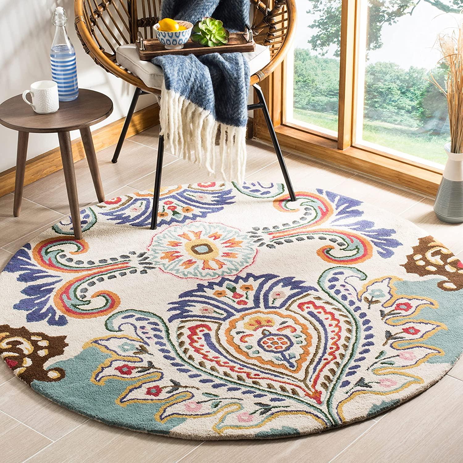 Round wool carpet rug with peacock feather design in cream, Bhadohi Carpets House decor