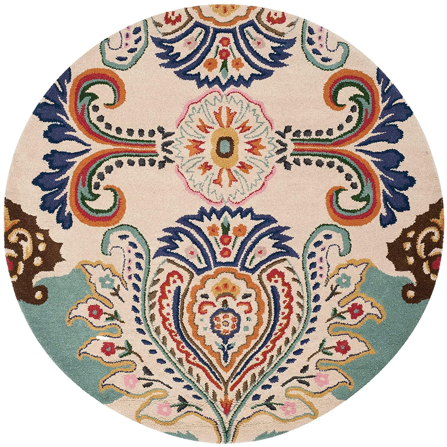 Round cream wool carpet rug with colorful peacock feather pattern from Bhadohi Carpets House