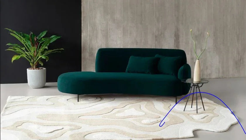 Modern living room with irregular cream carpet rug, green sofa, and Bhadohi Carpets House decor