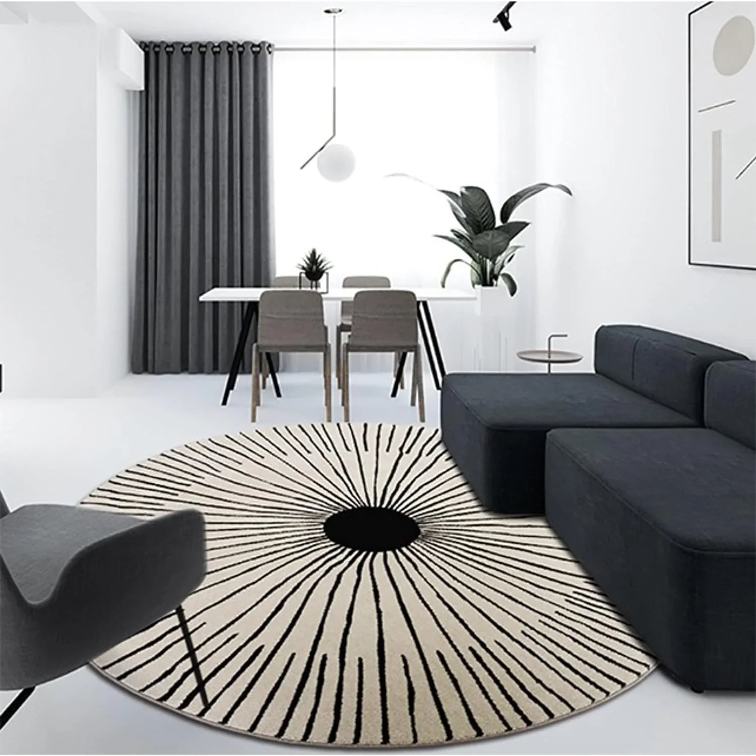 Modern living room with round wool carpet rug from Bhadohi Carpets House, black sofa, dining table