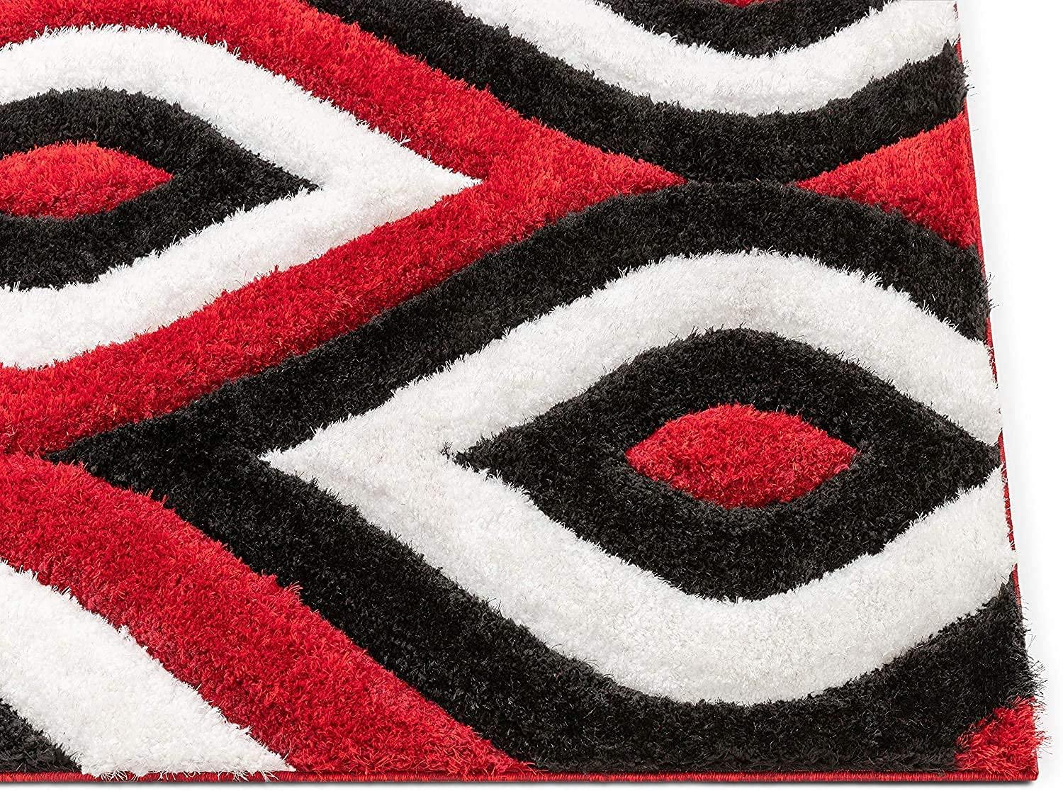 Shaggy carpet rug with bold red, black, and white geometric diamond pattern from Bhadohi Carpets House