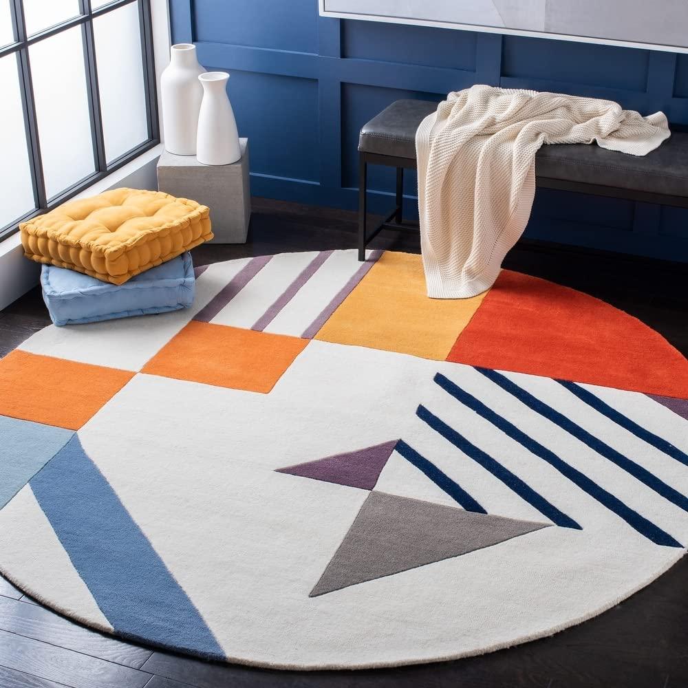 Modern round wool carpet rug with geometric patterns in a stylish living room, Bhadohi Carpets House