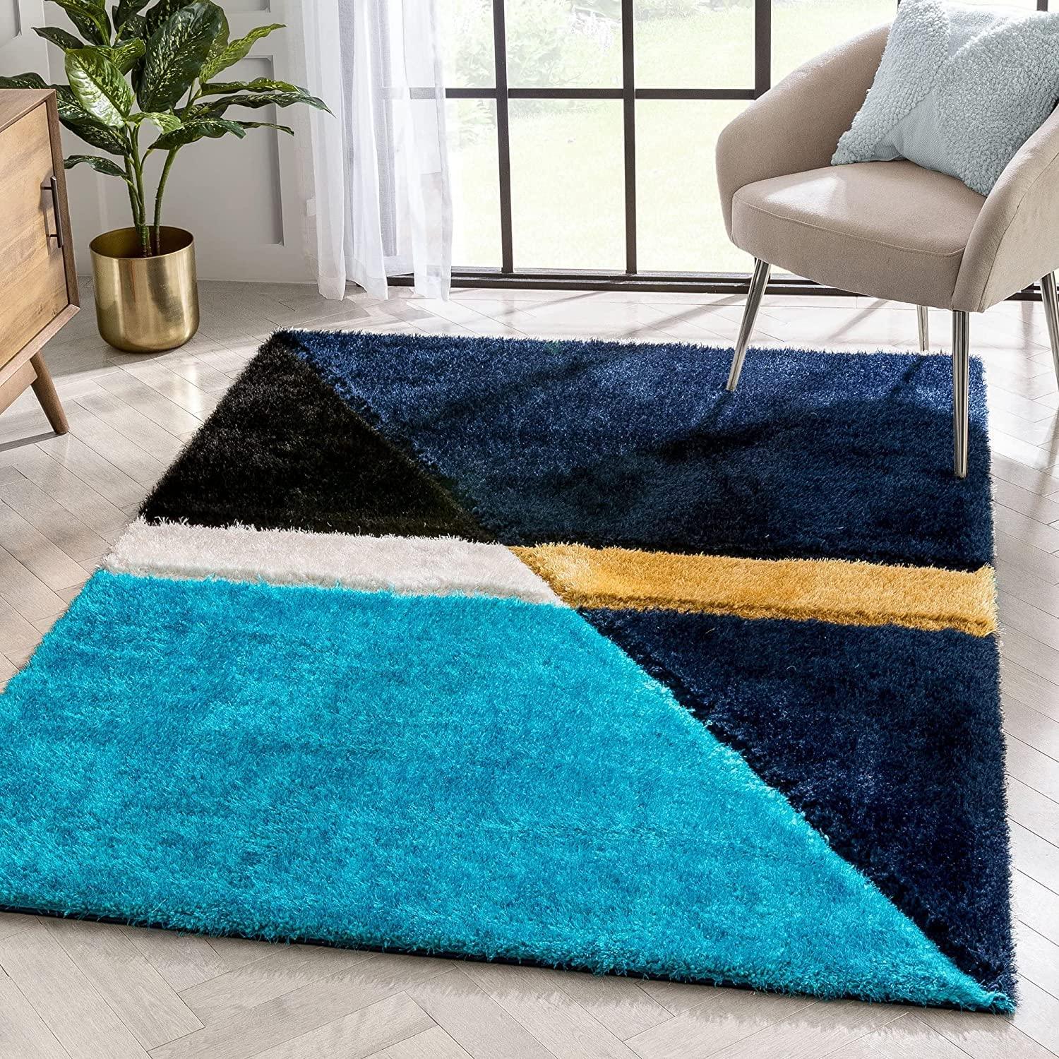 Modern living room with Bhadohi shaggy geometric carpet rug in blue, black, and yellow accents