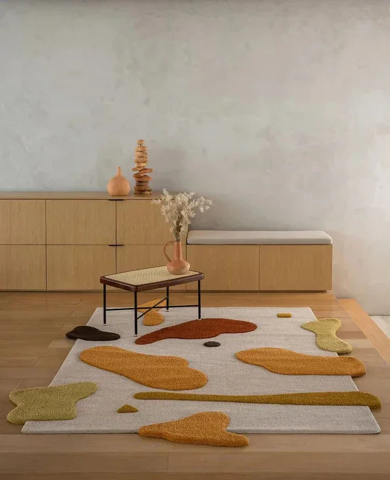 Modern living room with Bhadohi Carpets House Mist Irregular rug in earthy tones on wooden floor