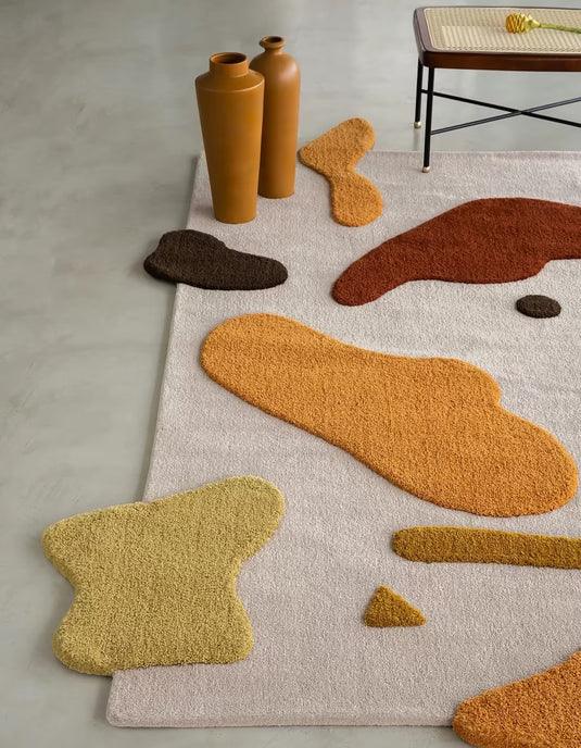 Modern Bhadohi Carpets House rug with abstract multicolor shapes on light background in home setting
