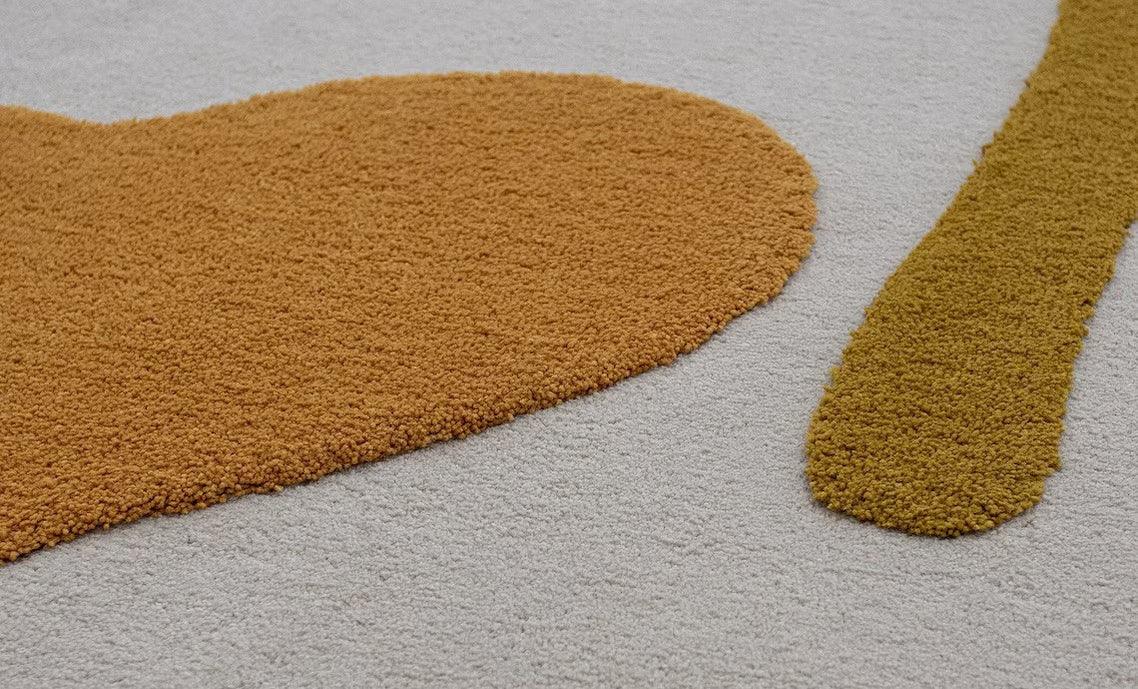 Modern irregular carpet rug with textured yellow and mustard shapes by Bhadohi Carpets House