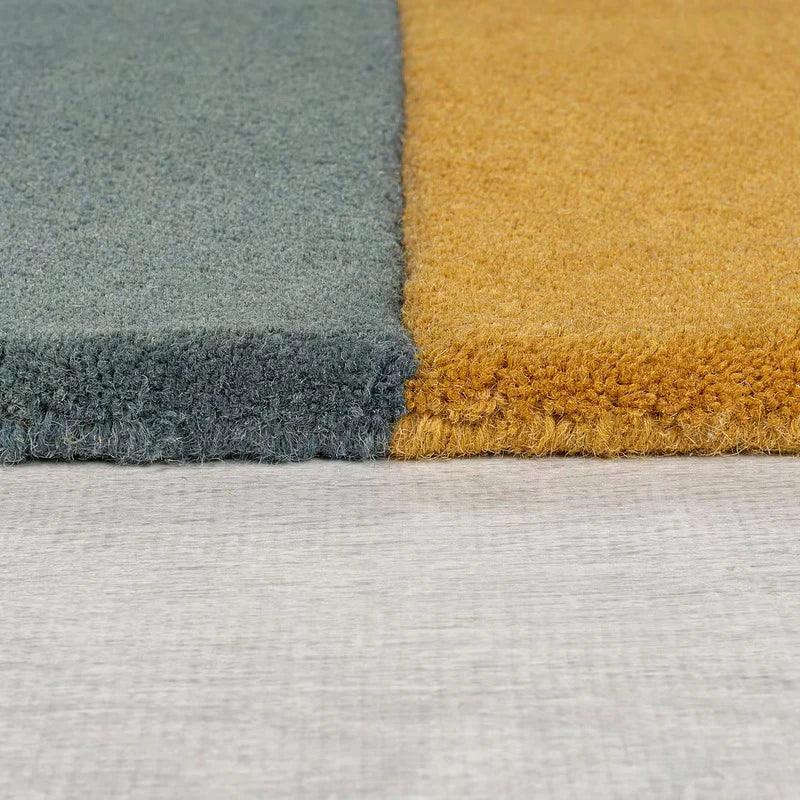 Close-up of Bhadohi Carpets House modern dual-tone irregular carpet rug, blue and mustard
