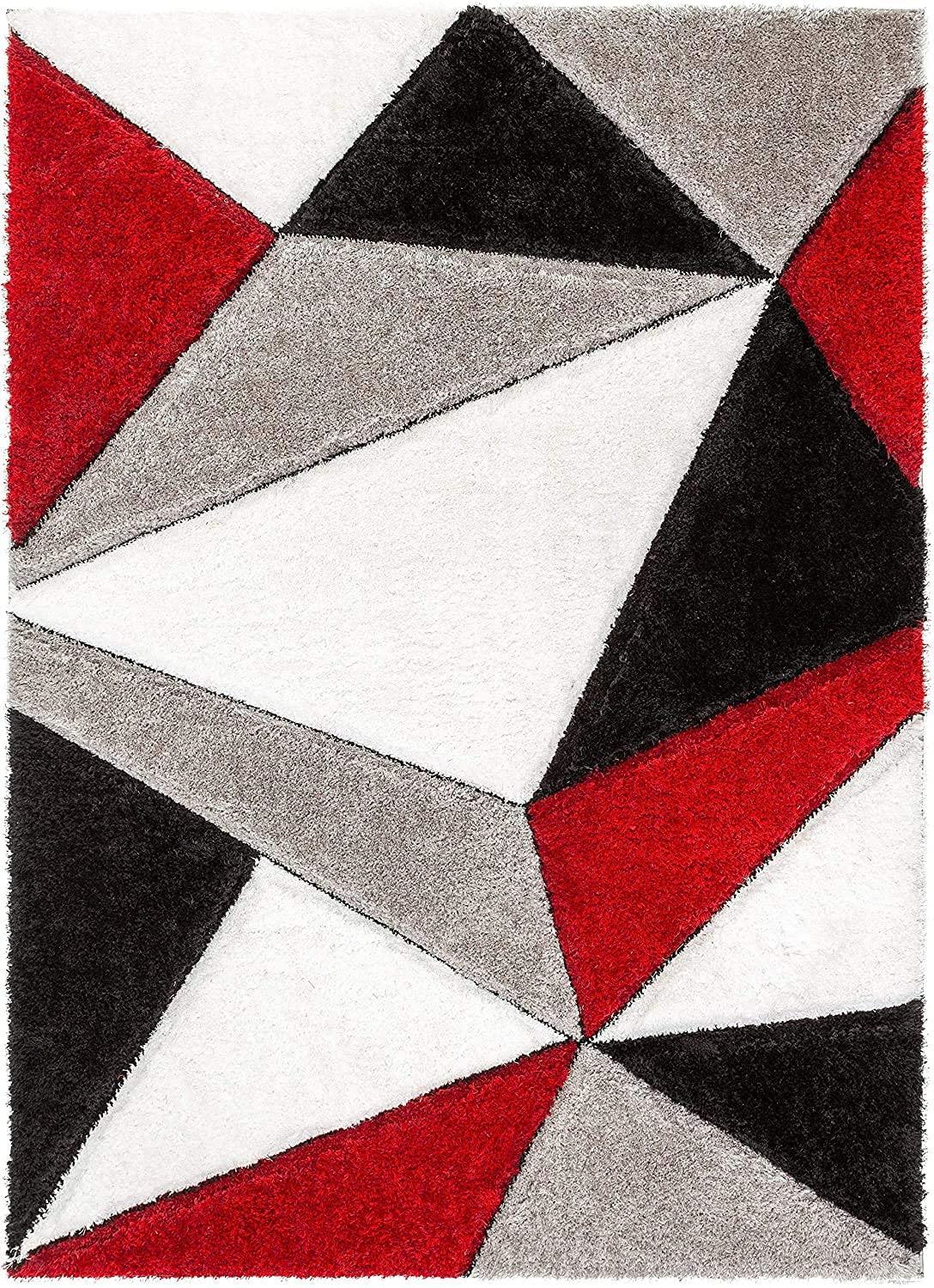 Modern shaggy carpet rug with geometric red, black, grey, and white triangles from Bhadohi Carpets House