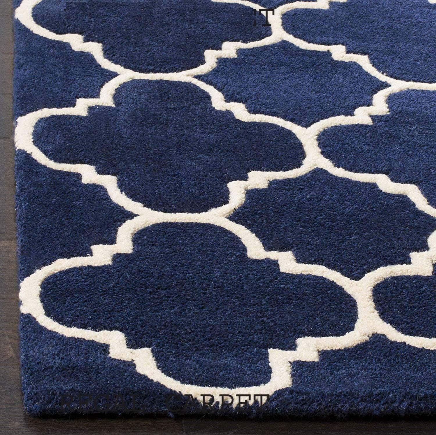 Navy blue wool carpet with white geometric pattern from Bhadohi Carpets House