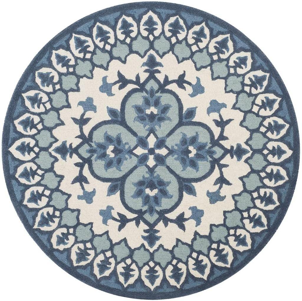 Round wool carpet with blue floral pattern, Bhadohi Carpets House premium rug design