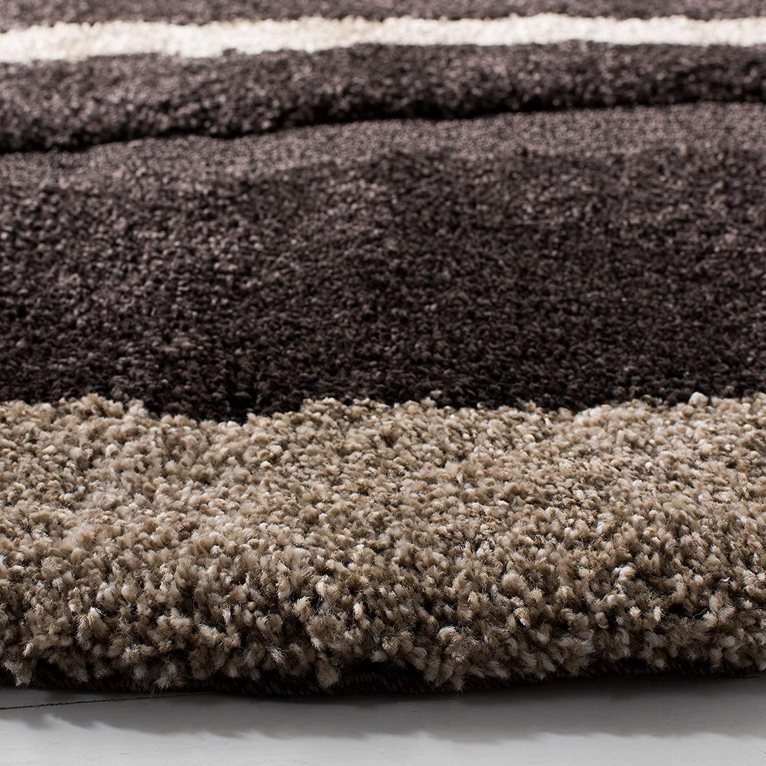 Close-up of plush, striped shaggy carpet rug in brown and cream from Bhadohi Carpets House