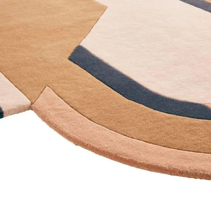 Modern abstract carpet with beige, navy and peach tones from Bhadohi Carpets House