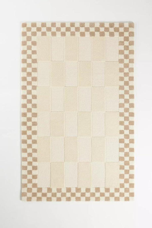 Beige and cream checkered cut-loop carpet rug from Bhadohi Carpets House on white background