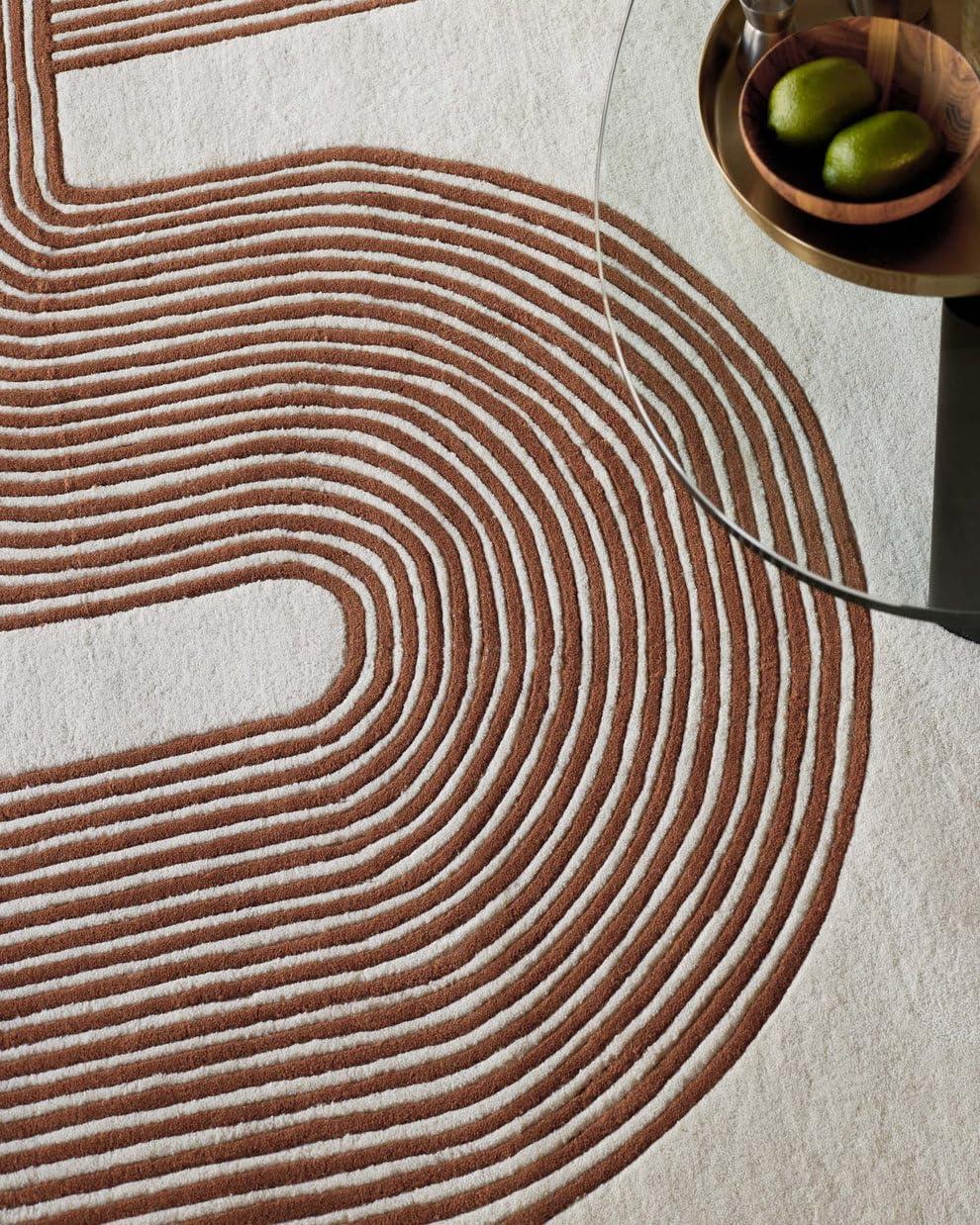 Modern hand-tufted carpet with brown ripple pattern from Bhadohi Carpets House, styled in home