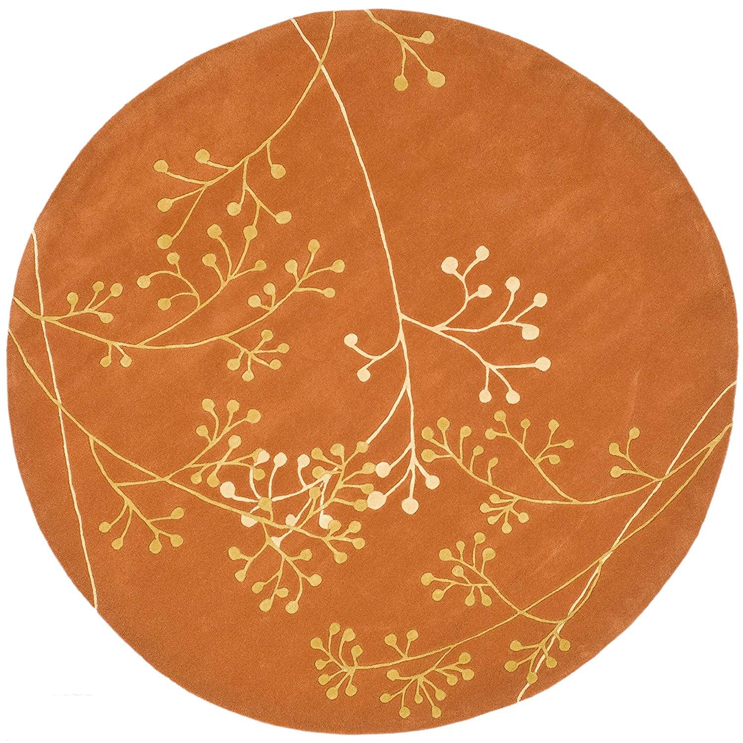 Rust berry round wool carpet rug with yellow botanical pattern from Bhadohi Carpets House