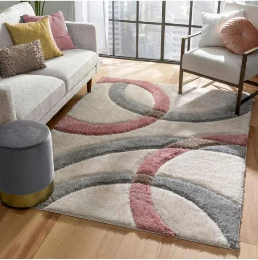 Modern living room with a Bhadohi shaggy carpet rug in grey and pink geometric pattern