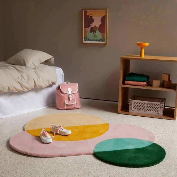 Modern bedroom with Bhadohi Carpets House multicolor irregular rug, bed, and shelf