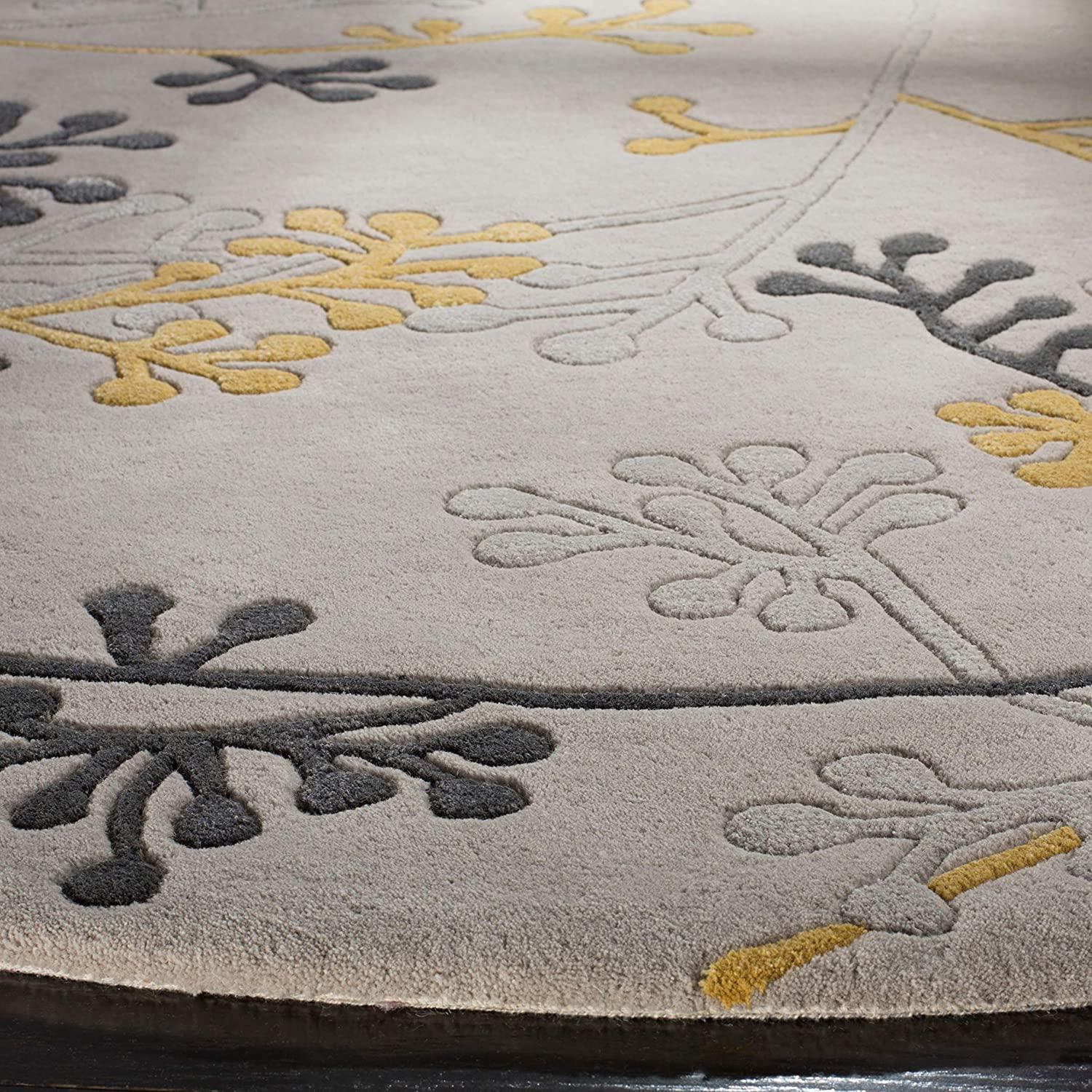 Silver berry round wool carpet rug with embossed yellow and grey floral design from Bhadohi Carpets House