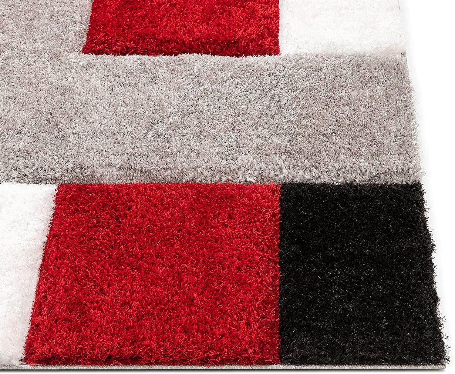 Shaggy carpet rug with red, black, white, and grey geometric blocks from Bhadohi Carpets House
