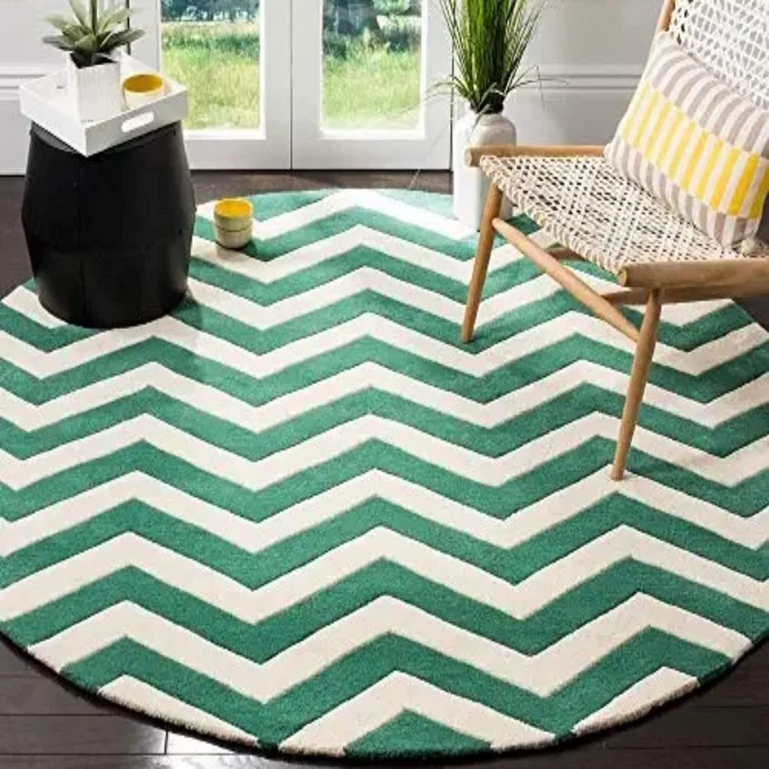 Green and white chevron round wool carpet in a modern living room, Bhadohi Carpets House