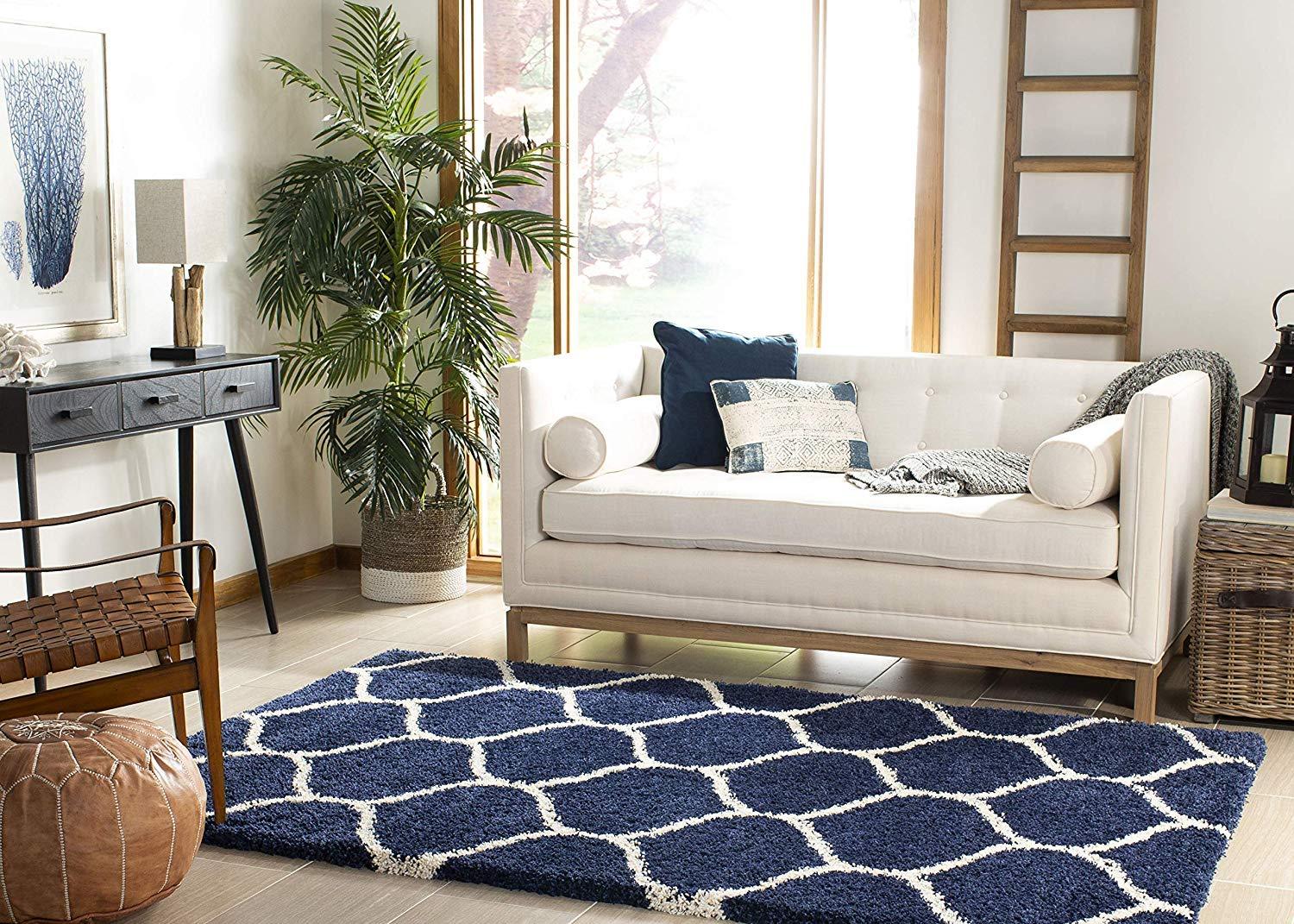 Modern living room with navy blue and white shaggy carpet rug from Bhadohi Carpets House