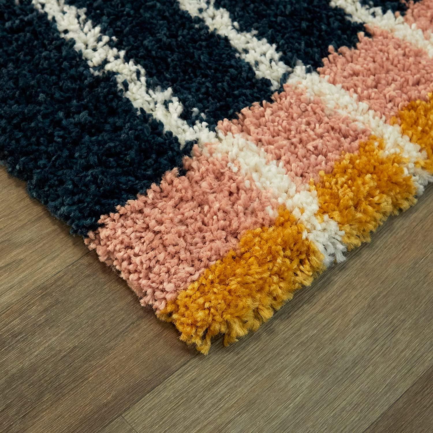 Multicolor shaggy carpet rug with striped pattern on wooden floor, Bhadohi Carpets House