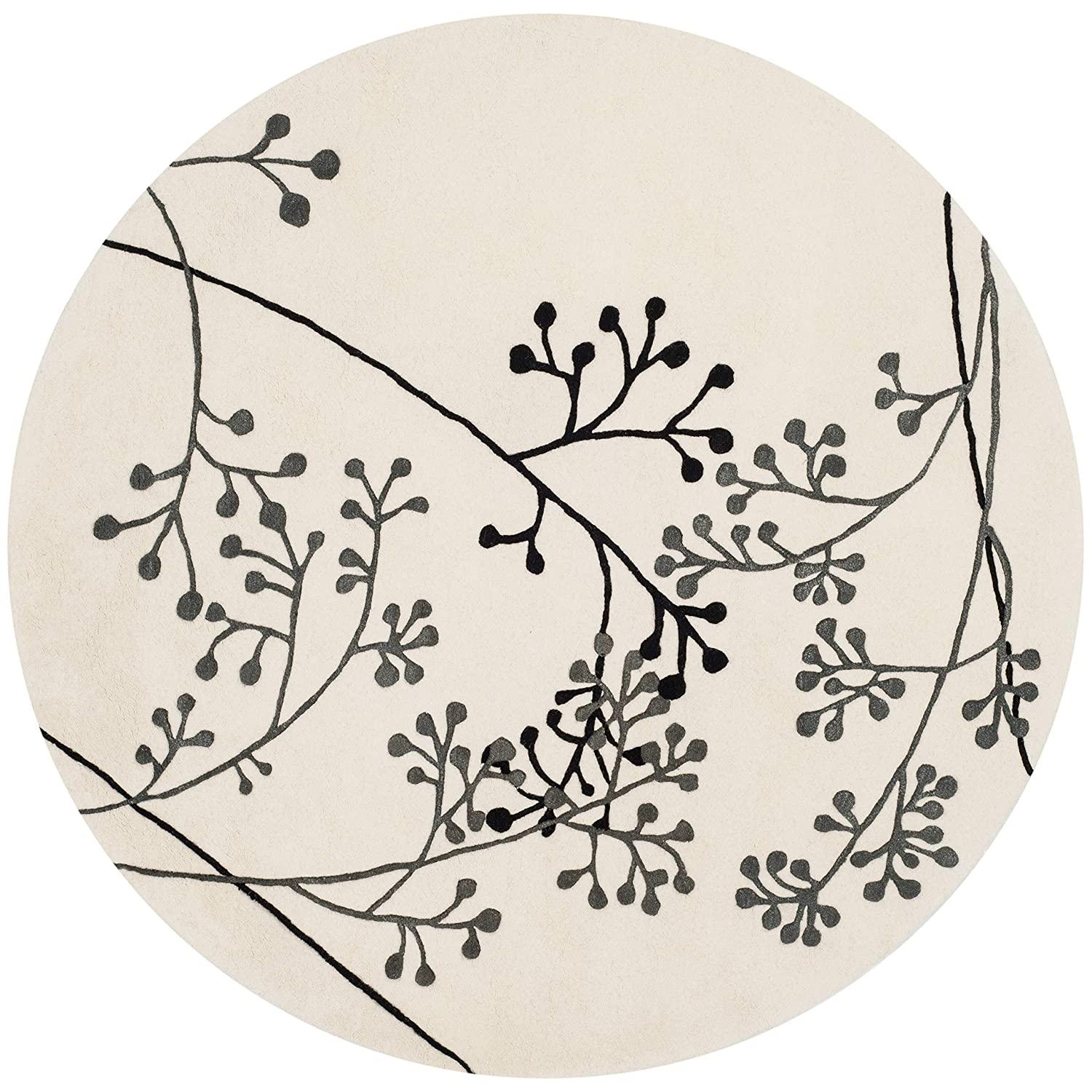 White round wool carpet rug with black and grey berry branch design, Bhadohi Carpets House