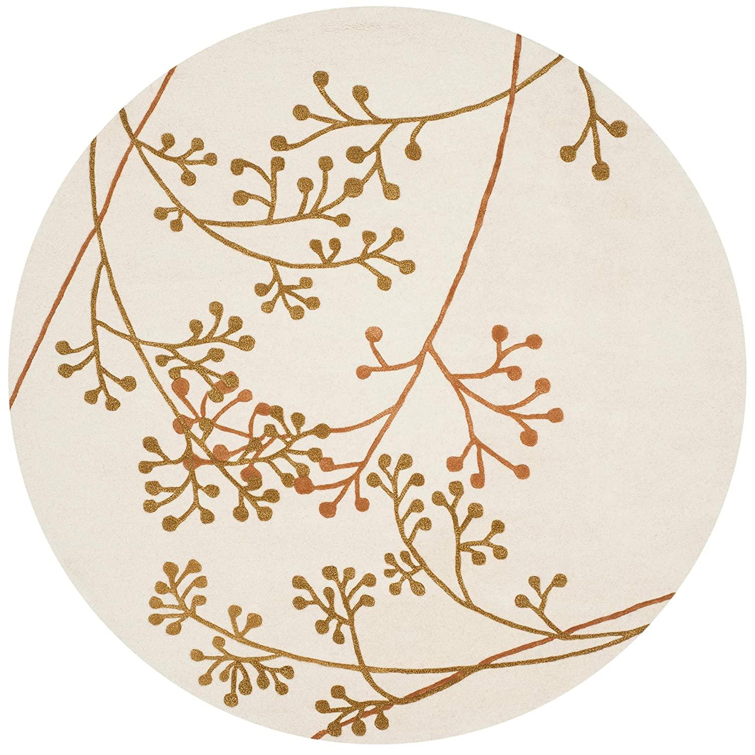 Round white wool carpet with gold and berry branch pattern, Bhadohi Carpets House.